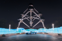 InMotion Racecar in front of Atomium with light painting
