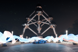 InMotion racecar in front of Atomium Brussels with double lightpainting