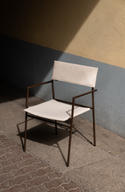 Montis Yves chair white in the sun with hard shadows during Milan design week 2024